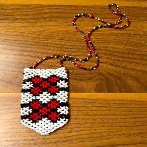 Handmade Native American seed bead medicine pouch.